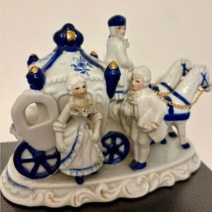 Porcelain Carriage Figurine with Blue Accents